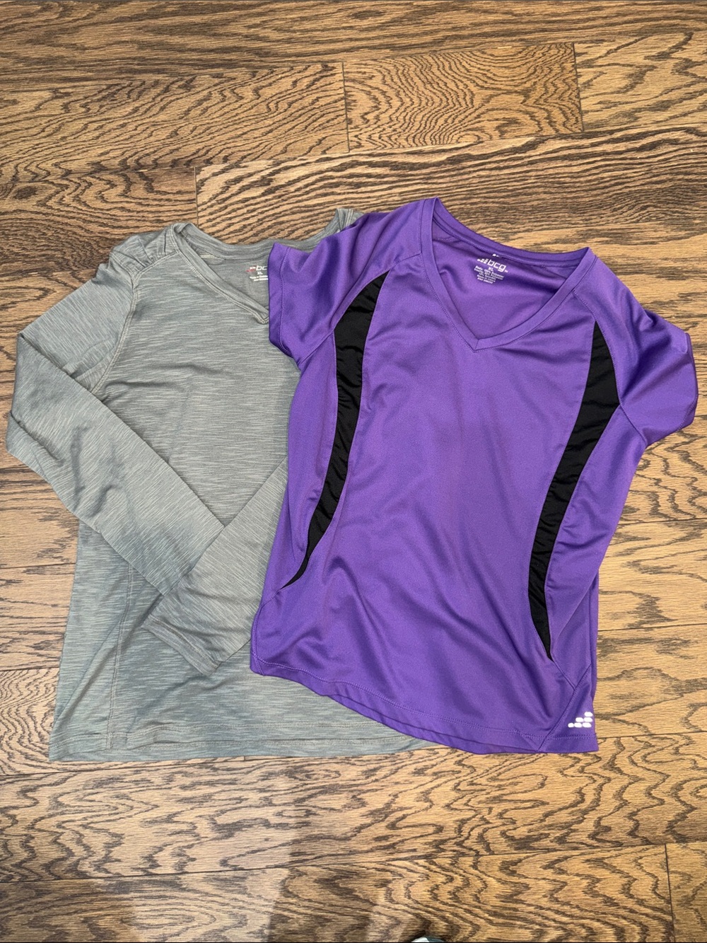 2 women’s BCG shirts size XL.